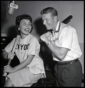 Mickey Mantle and Teresa Brewer recording the song "I Love Mickey" in the recording studio.